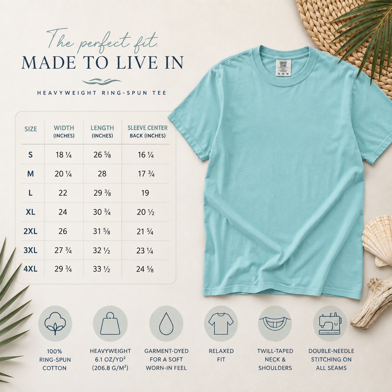 A light blue short-sleeve t-shirt displayed on a cream background with a size chart, fit text, and feature icons. The shirt is styled with beach-themed props including a woven hat, seashell, and palm leaves.