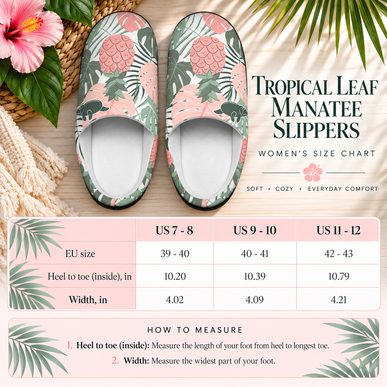 Tropical leaf manatee slippers shown on a styled flat-lay with a size chart and measurement instructions below. The slippers have a pink, green, and beige palm and leaf print.