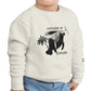 Child wearing a white sweatshirt with a graphic design on a white background