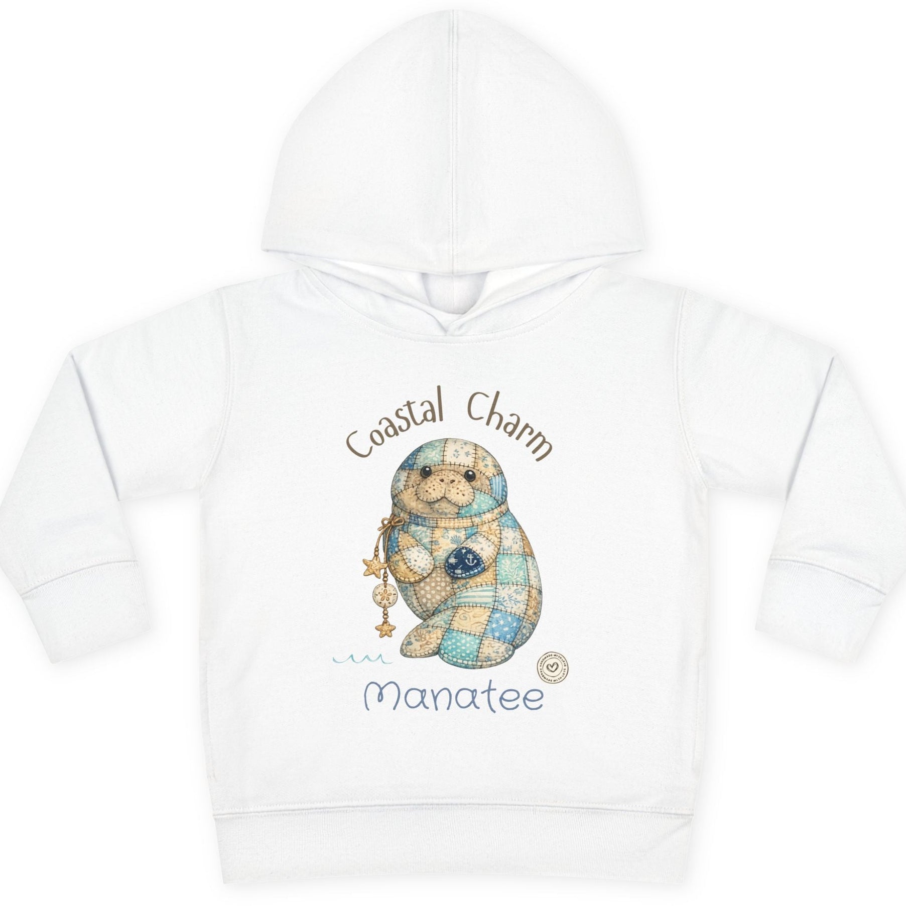 White hoodie with a manatee design and 'Coastal Charm Manatee' text on a white background