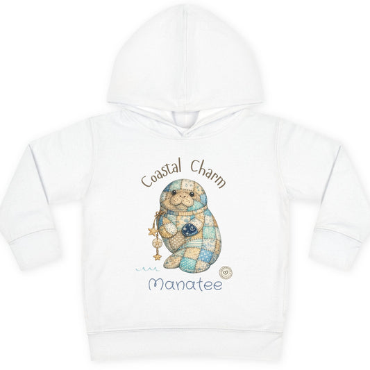 White hoodie with a manatee design and 'Coastal Charm Manatee' text on a white background