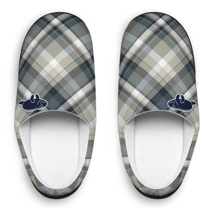 A pair of slip-on slippers with a gray, beige, and white plaid pattern, featuring a small navy blue dog logo on the side, shown against a plain white background.