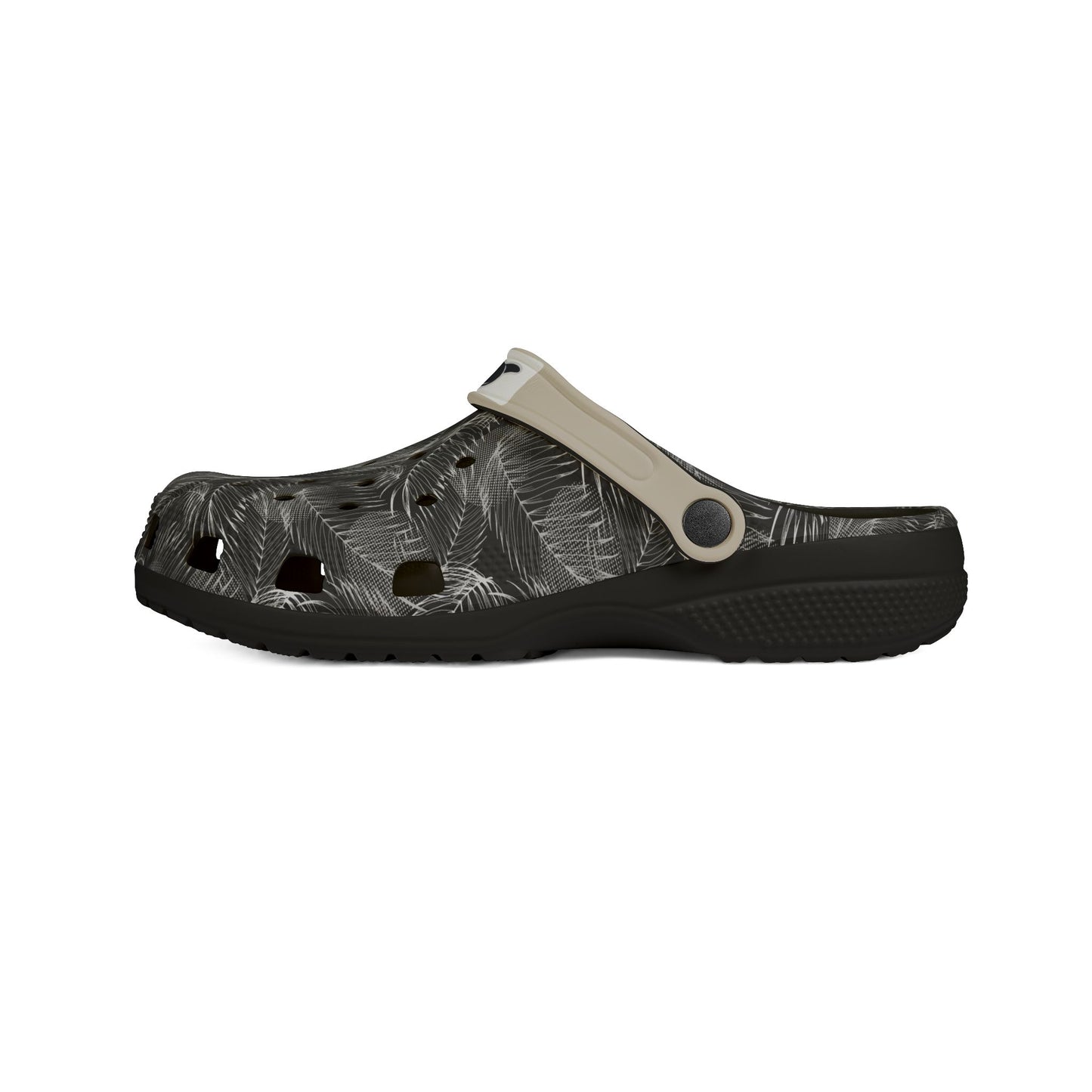 A single clog-style sandal with a black and gray palm leaf pattern on the upper, a black sole, and a light beige strap, shown from a side profile on a white background.