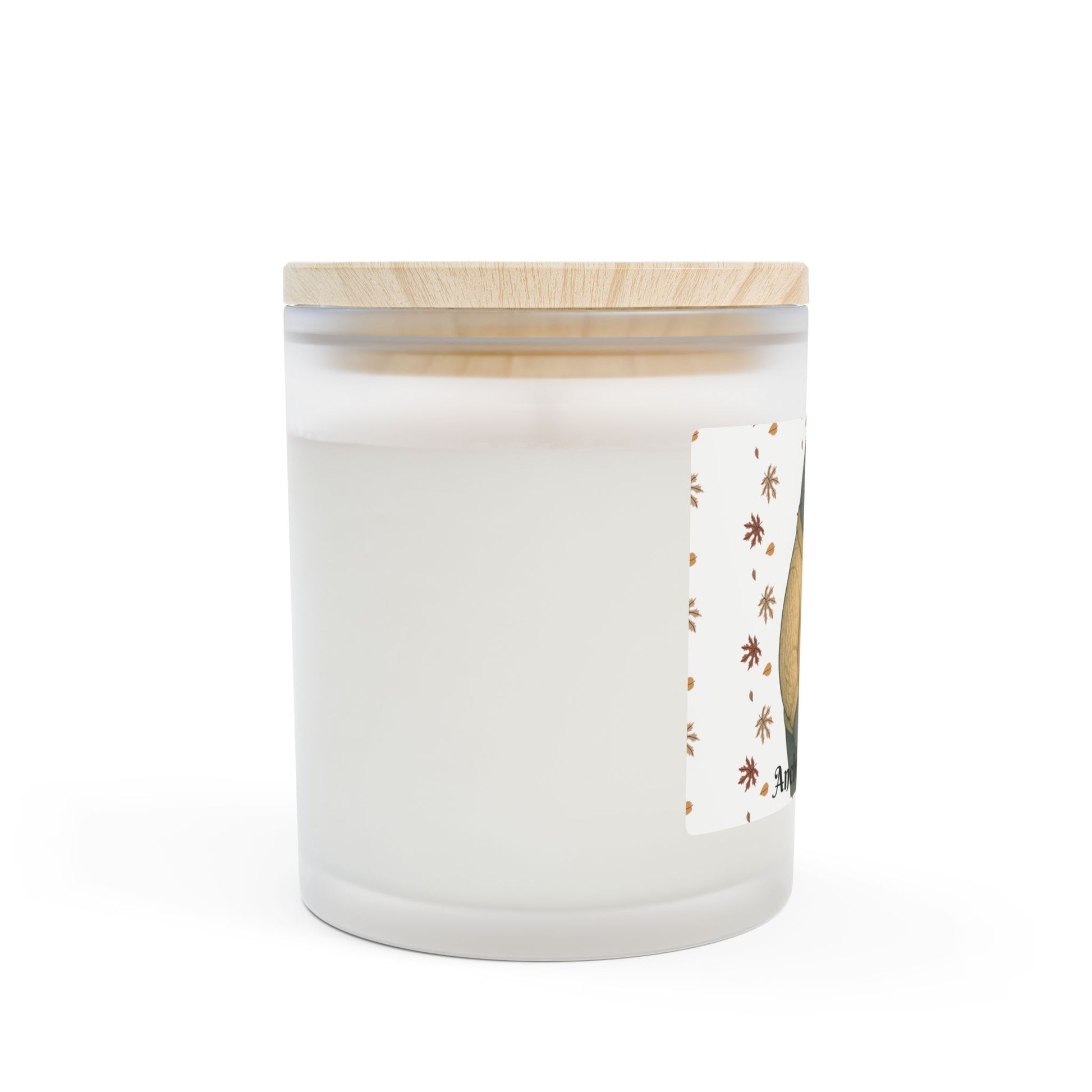 White candle with a wooden lid and decorative label on a white background