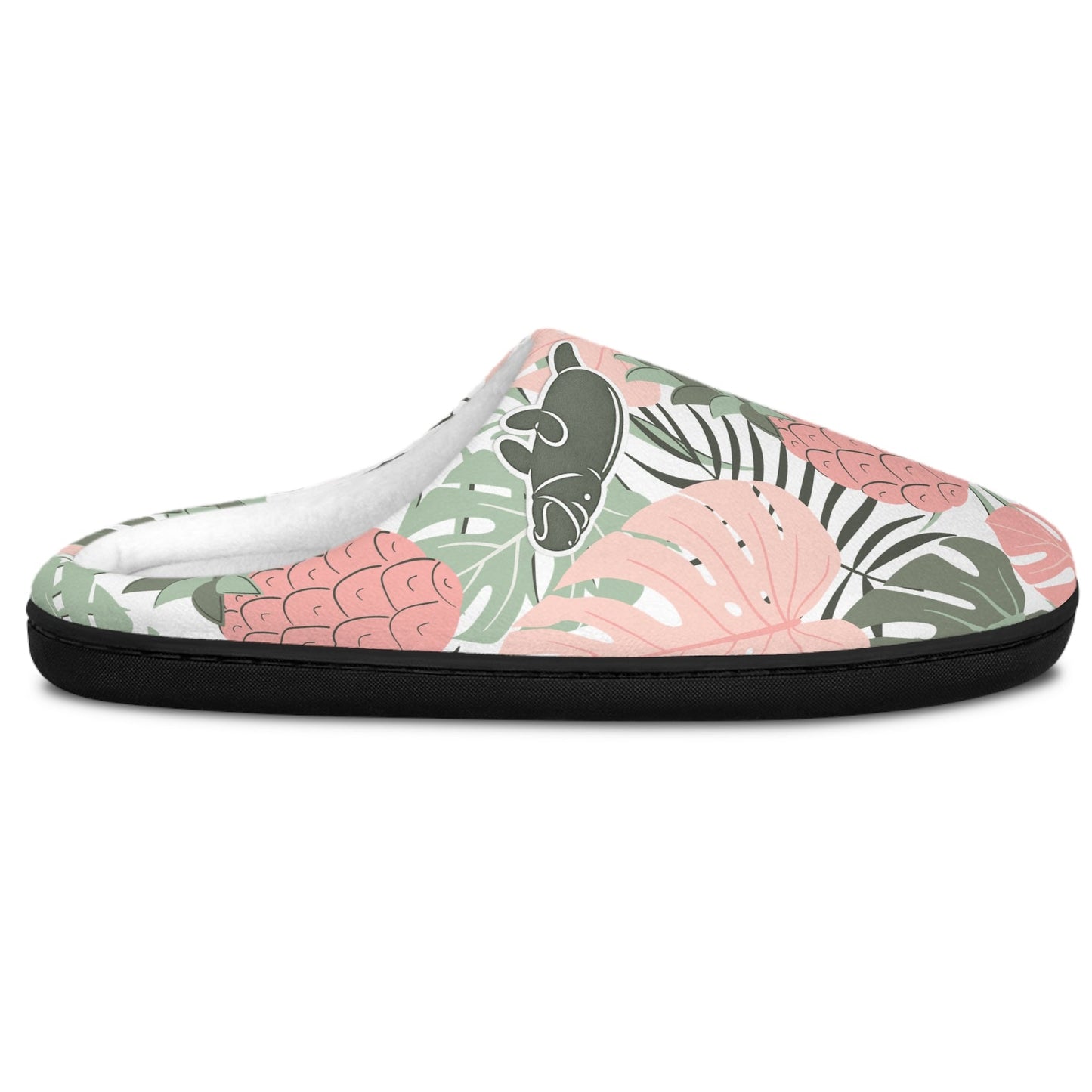 A single slip-on mule slide shoe with a tropical leaf pattern in pink, sage green, and black on a white background.