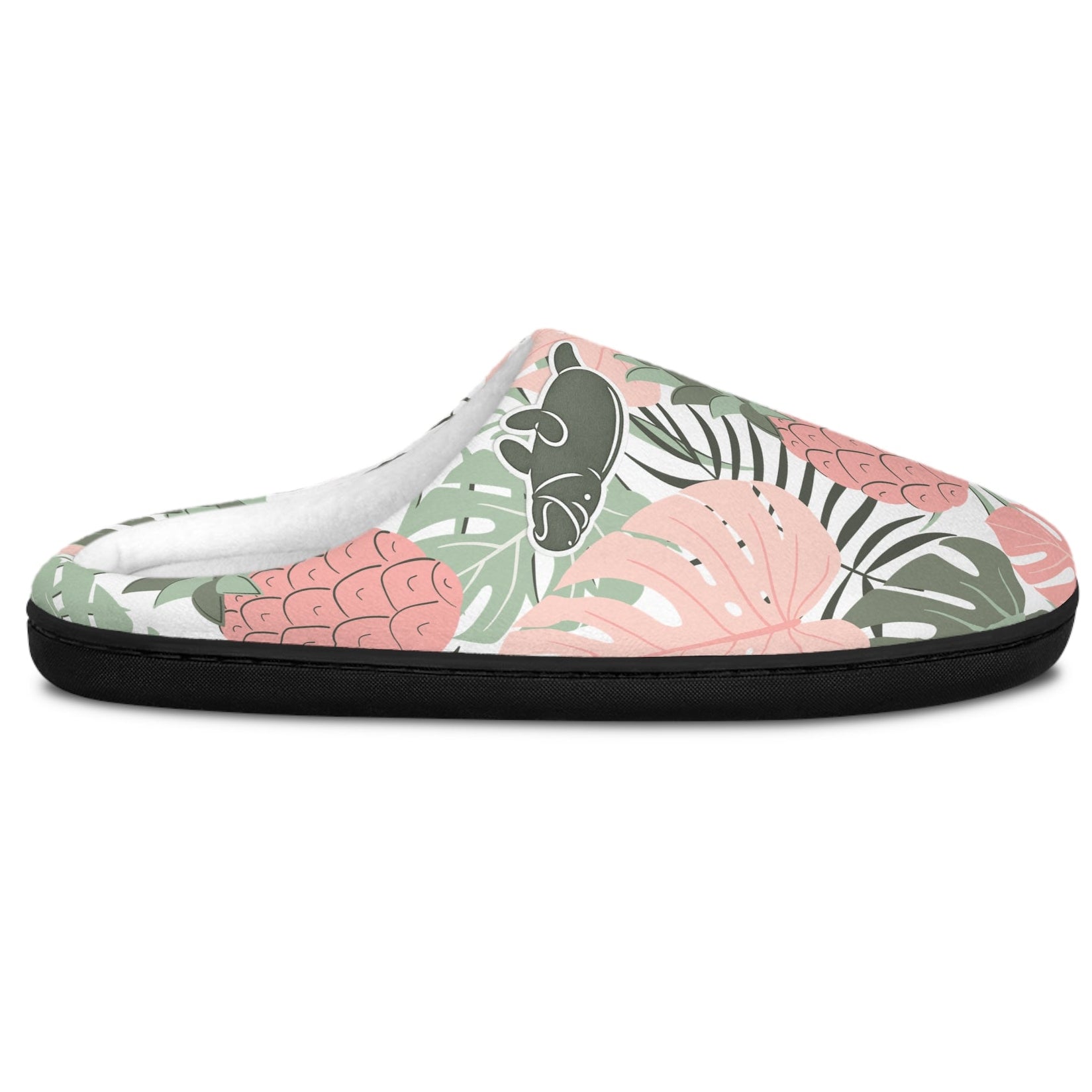 A single slip-on mule slide shoe with a tropical leaf pattern in pink, sage green, and black on a white background.