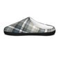 A single slip-on mule slipper with a gray, white, and black plaid pattern on the upper, a white interior lining, and a black sole, shown against a plain white background.