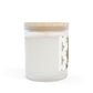 White candle with a wooden lid on a white background