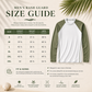 A size guide infographic for a men's rash guard, featuring a measurement chart with chest, waist, and hips in inches for sizes S through 3XL, alongside a green and white long-sleeve rash guard and product feature icons on a beige background.