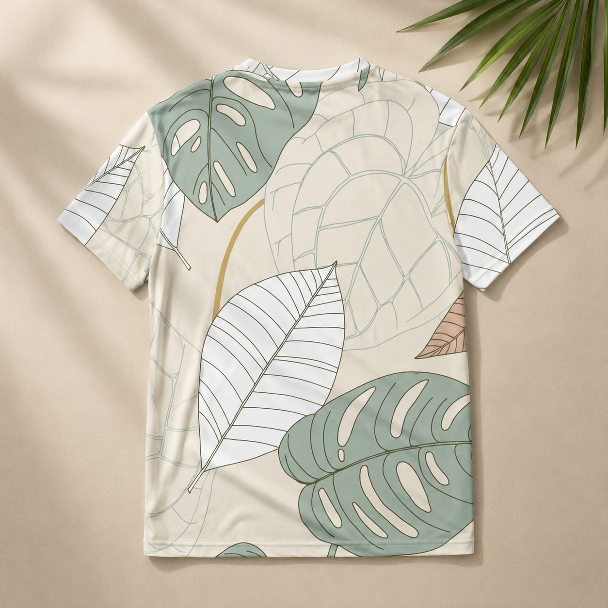 T-shirt with leaf pattern on a beige background