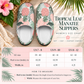 Tropical leaf manatee slippers shown on a styled flat-lay with a size chart and measurement instructions below. The slippers have a pink, green, and beige palm and leaf print.