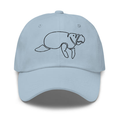 A blue unstructured low-profile hat with a curved visor, featuring an embroidered manatee design on the front.