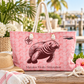 A pink canvas tote bag with a manatee illustration and rope handles, styled on a wooden dock with tropical plants, a straw hat, and a towel in the background.