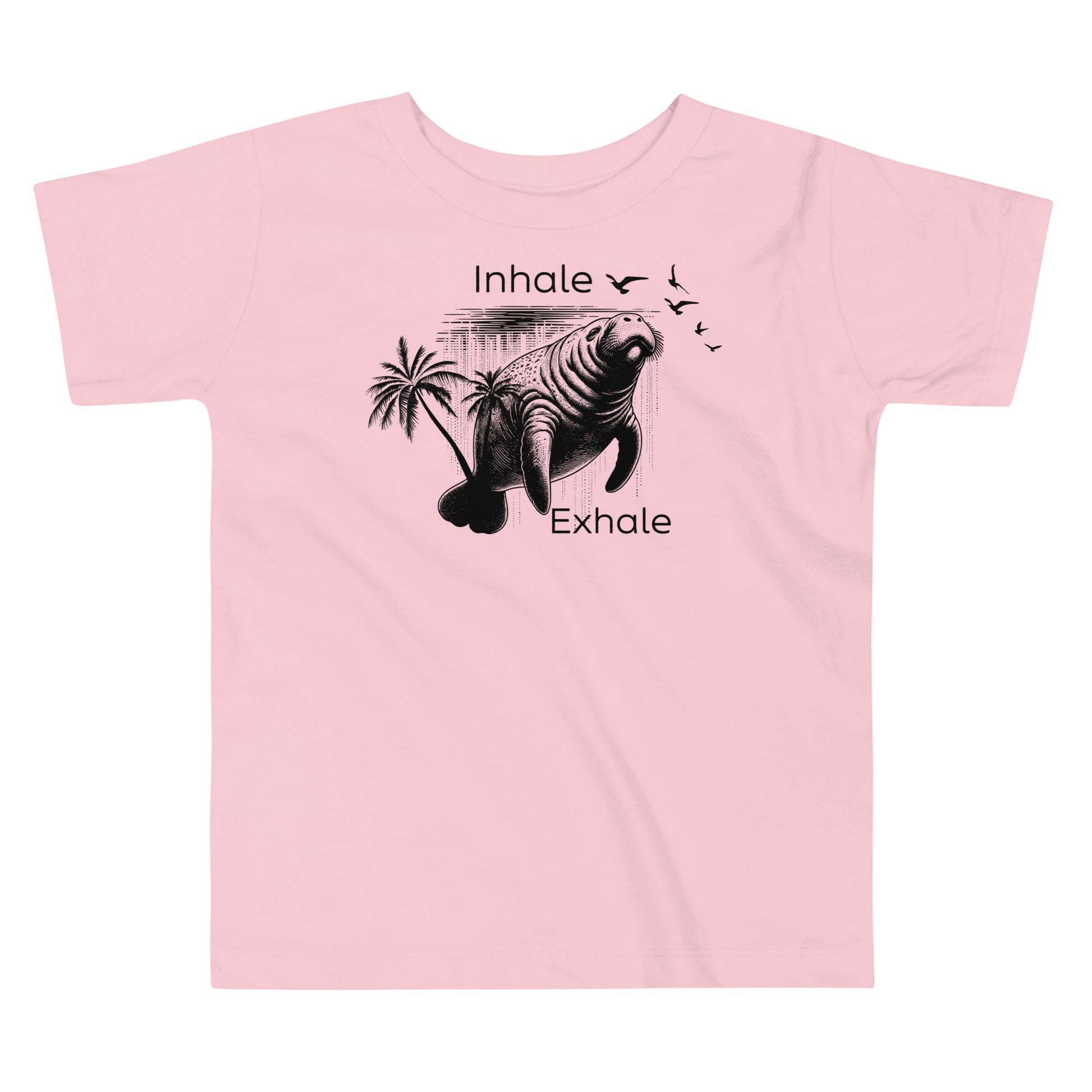 A pink toddler t-shirt with a graphic of a manatee and the text 'Inhale' and 'Exhale' on it.