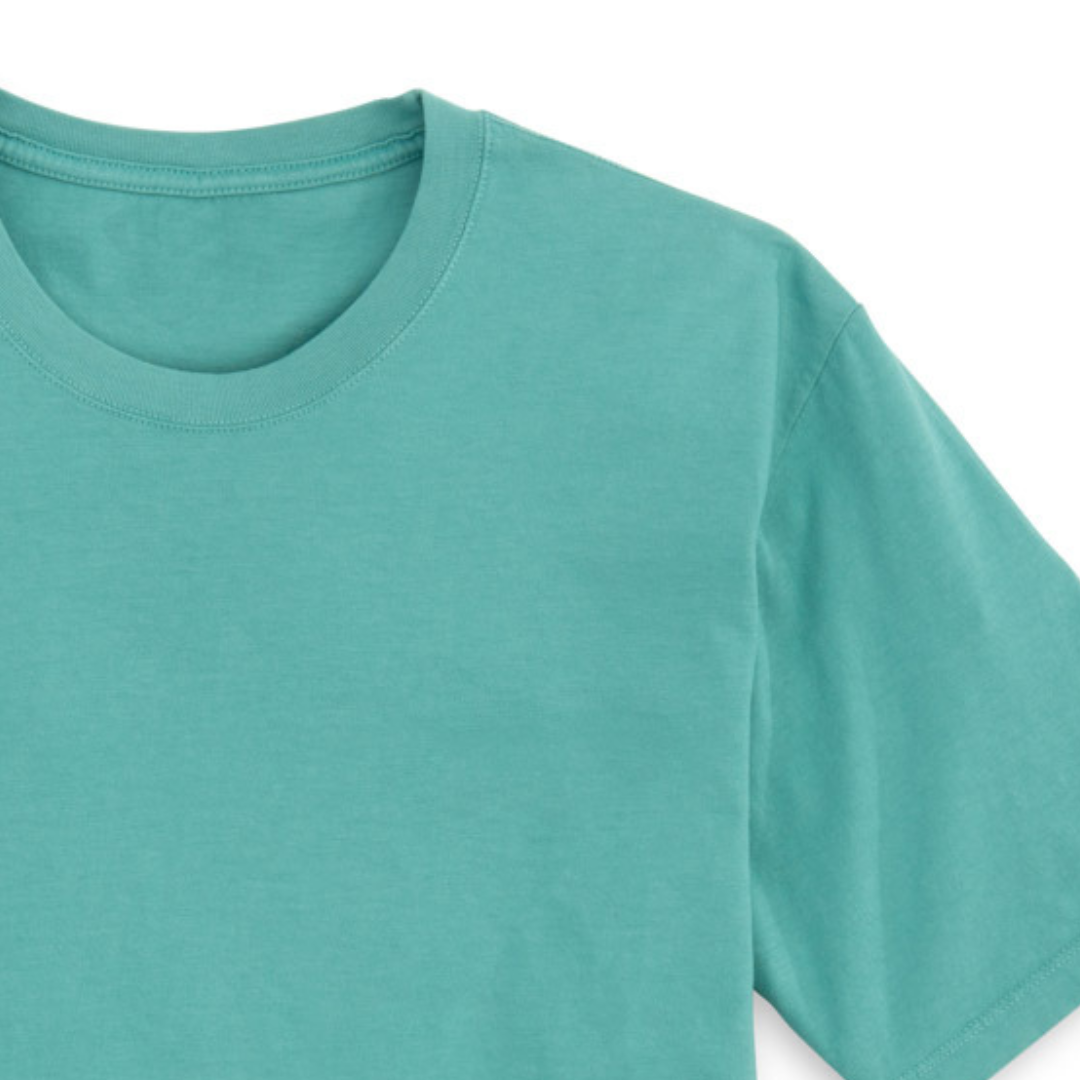 A side-view of the Seafoam Manatee Wave T-Shirt, displaying its knit tight work with fine yarn to control torque, garment washed to remove almost all shrinkage and enzyme butterwashed to give the smoothest surface.
