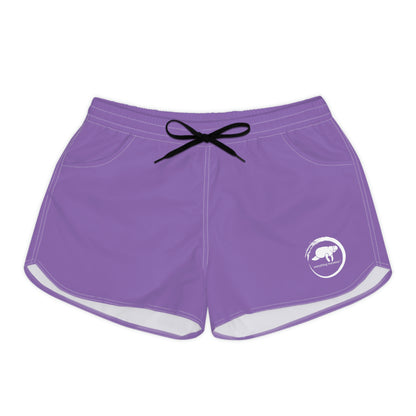 A pair of purple manatee wave shorts with an elastic waistband and drawstring, featuring two side pockets.